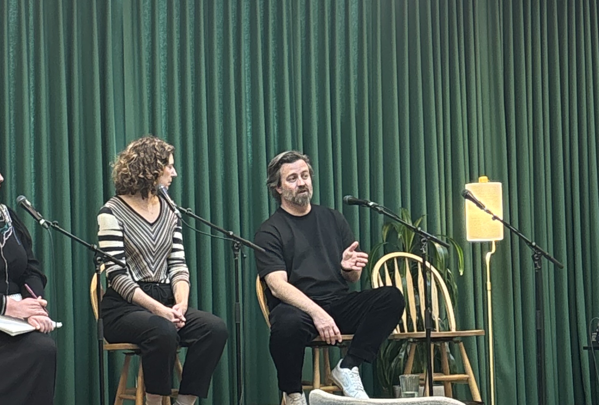 Casey Milone speaking on a panel about fiction writing